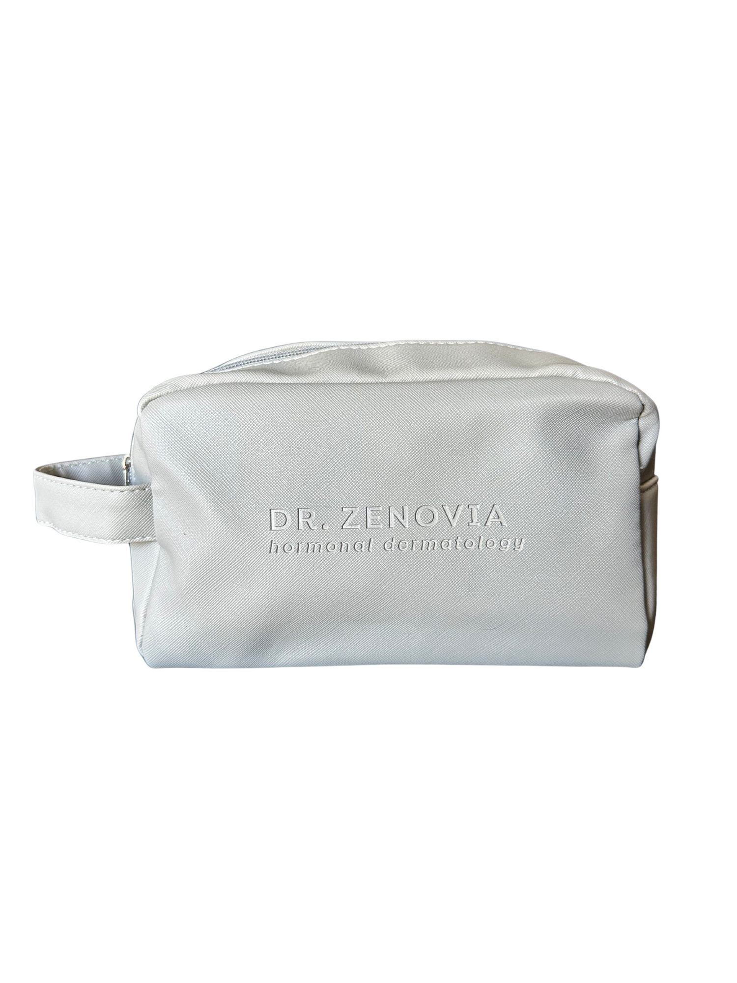 Gray faux leather Dr. Zenovia skincare travel bag with debossed logo, compact rectangular shape, ideal for organizing skincare products on the go.