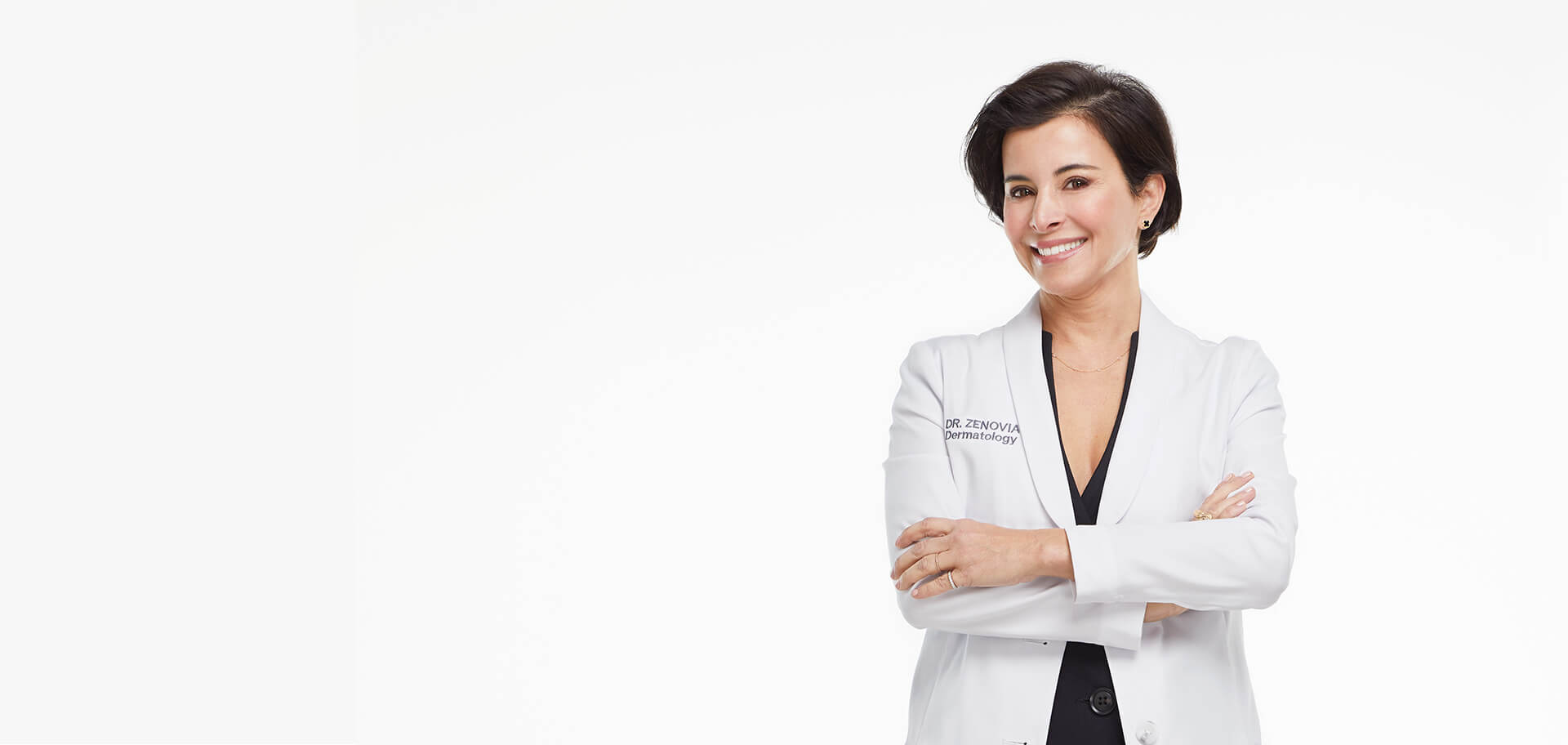 Dr. Zenovia in front of a white background