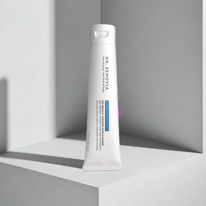 Dr. Zenovia Acne Cleanser tube in front of a white background with shadows