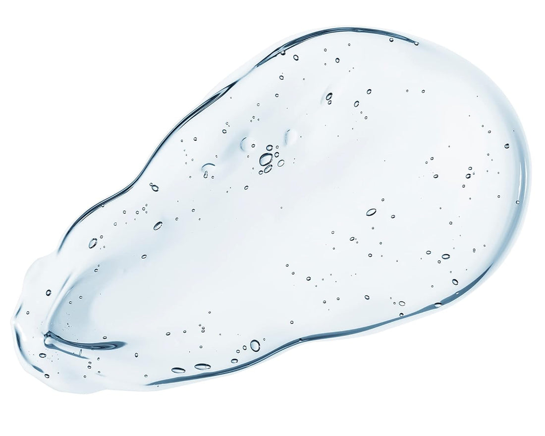 Clear gel or cream with bubbles on a white background