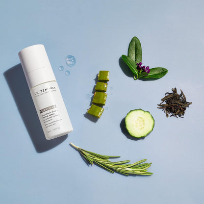 Skincare bottle with natural ingredients on a light blue background