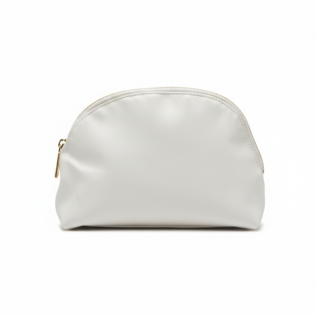 Front view of cream faux leather cosmetic bag with gold zipper closure on white background