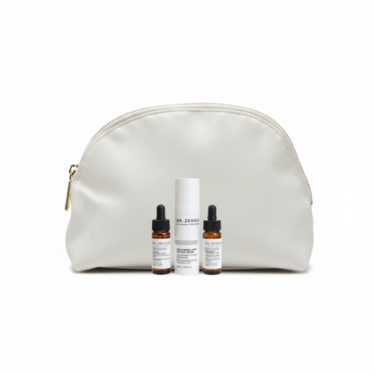 Cream cosmetic pouch with skincare products on a white background