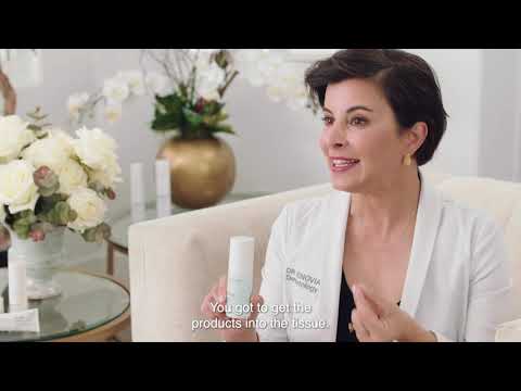 Video of a dermatologist applying Dr. Zenovia Hyaluronic Acid + Peptide Serum to a model’s face
